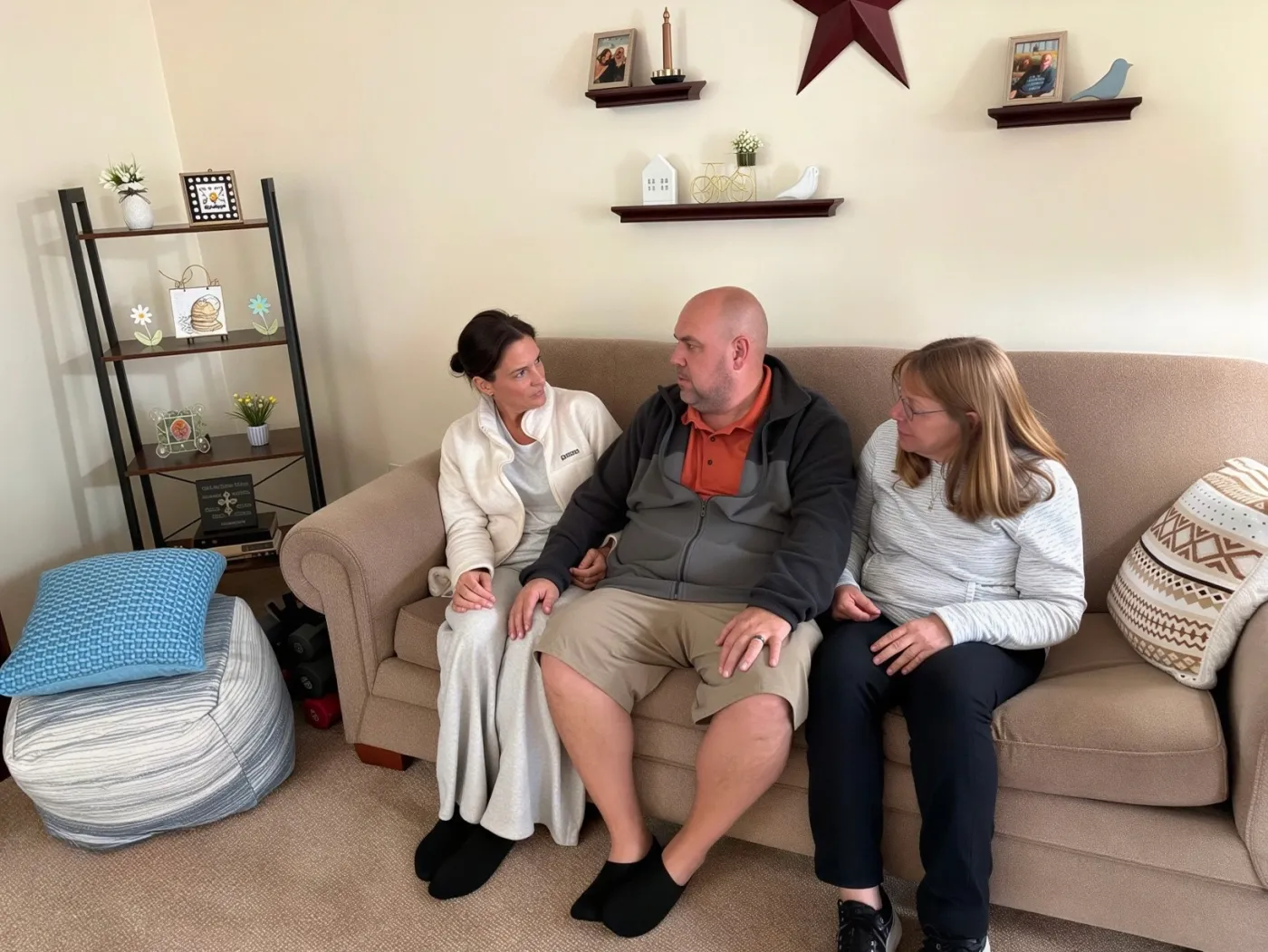 Support workers sharing a quiet moment with a client at home